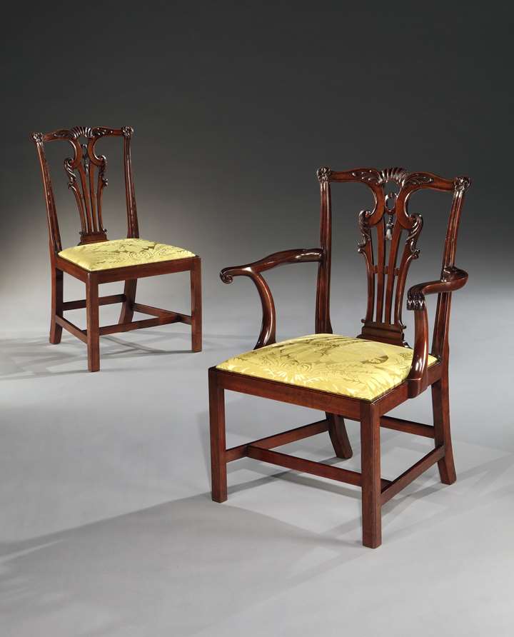 A SET OF TEN GEORGE II MAHOGANY DINING CHAIRS